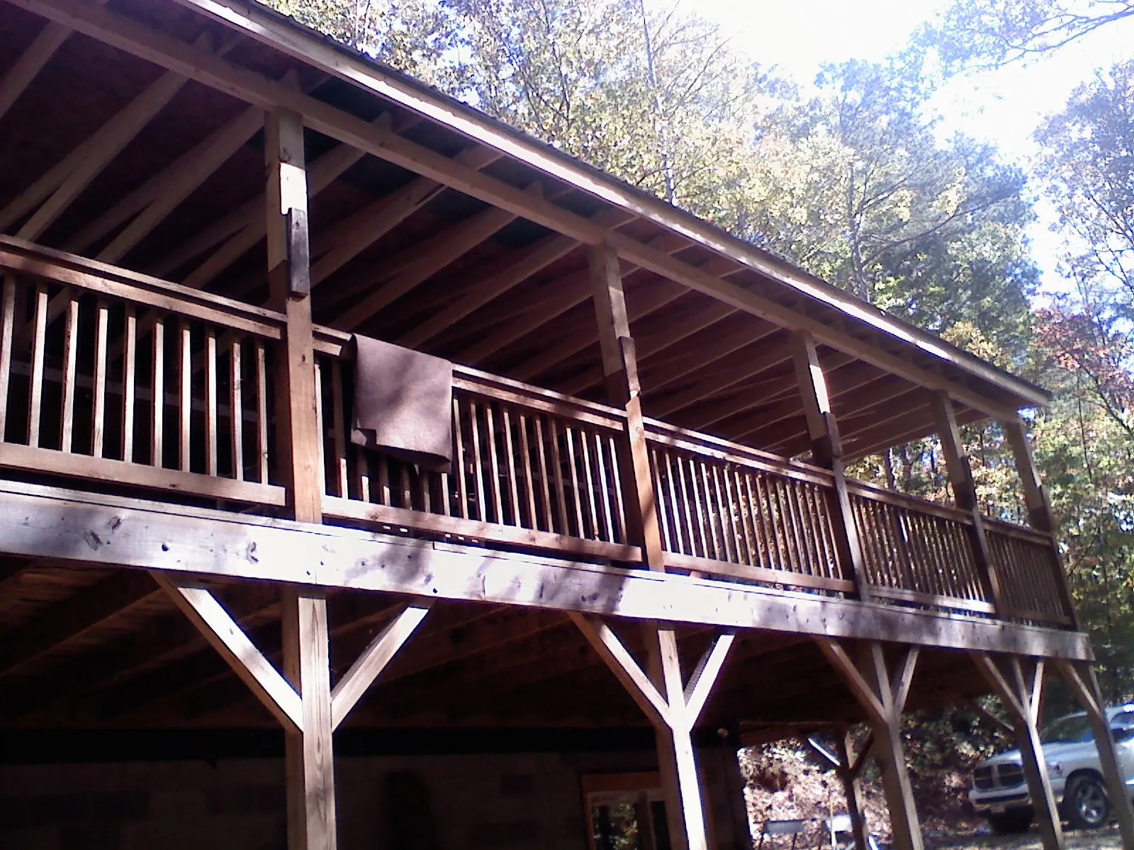 Timber framing under a new elevated porch and deck — Roof Leak Repair in Parsons by Roofing Brothers